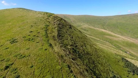 Low flight over mountain range in beautiful summer day Stock Footage 79097455