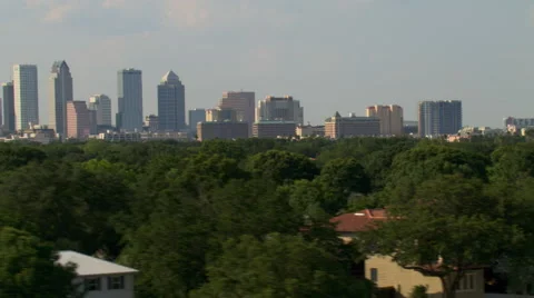 Low flight over residential Tampa, Florida  with city skyline in background Stock Footage 59497661