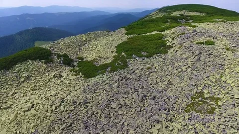 Low flight over rocky mountain ridge Stock Footage 79712193