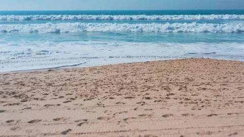 Low Flight Over the Sandy Beach and Waves Stock Footage 105198090