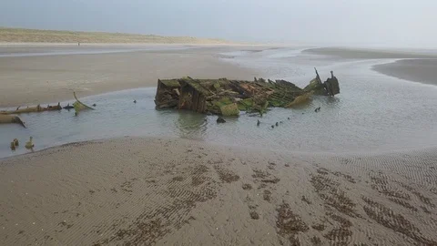 Low flight over a ship wreck Stock Footage 108689001