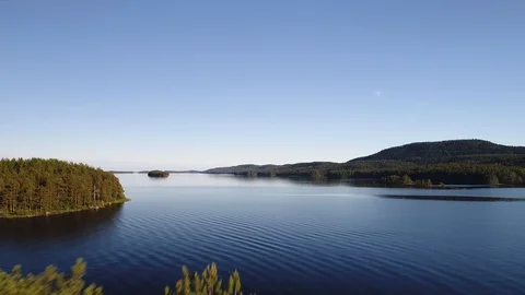 Low Flight Over Trees and Finnish Lake 스톡 동영상 123061700