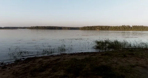 Low flight over the water from the beach Video stock 94928038