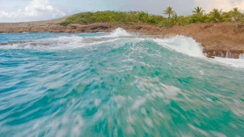 Low Flight Over Water Too Close to Wave 4K Stock Footage 116508805