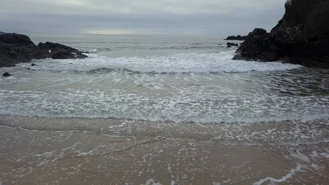 Low flight over waves DJI 0034 Stock Footage 108580563