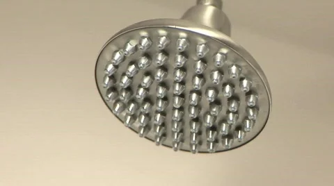 Low Flow Shower head turning on and spraying water 스톡 동영상 100272