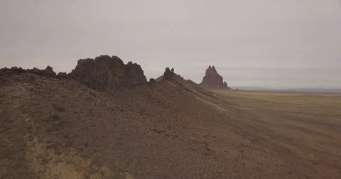 Low fly over epic rock formations in New Mexico Stock Footage 81530967