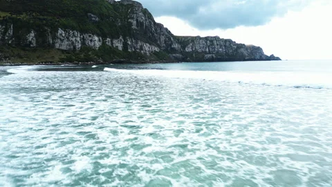 Low fly over waves in Parakanui bay. a very lovely Doc site (department of Video stock 244781596