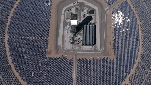 Low Flyby Across Mirror Array in Nevada Solar Installation Stock Footage 312905770