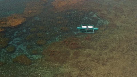 Low flyby over clear waters in Palawan, Philippines. 4k drone flight Stock Footage 93969591