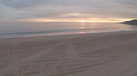 Low flying Aerial in reverse over lifeguard tower at Malibu beach at sunset #14 Stock Footage 46627276