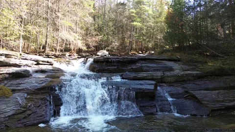 Low Flying Aerial of a Waterfall Stock Footage 264553791