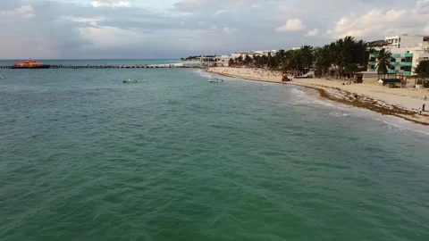 Low flying along beach in Playa Del Carmen Stock Footage 276839309