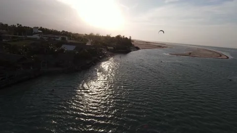 Low flying dive FPV Drone shot of Brazilian Kite Lagoon during sunset. 스톡 동영상 196888448