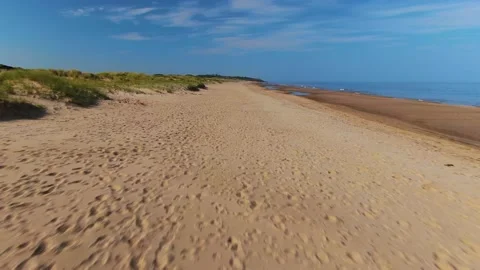 A low flying drone shot of Old Bawn beach in County Wexford. Stock Footage 155634742