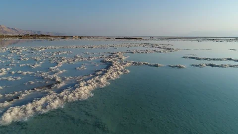 Low flying drone shot over the salt formation of the Dead Sea. DJI_0038-03 스톡 동영상 104497012