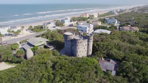 Low-flying drone sweep across the massive coquina walls of the St. Augustine Stock Footage 332811773