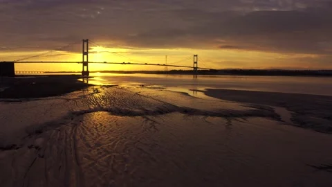 Low flying sunrise view over the River Severn mud flats Видео 164733963