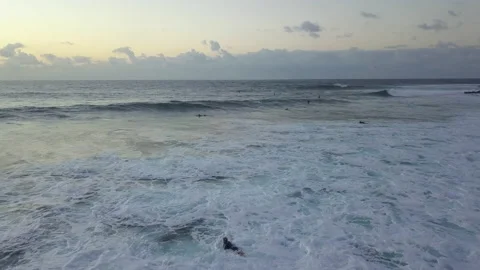 Low flying surfing waves at sunset in La Santa Lanzarote Spain Canary Islands Stock Footage 218281827