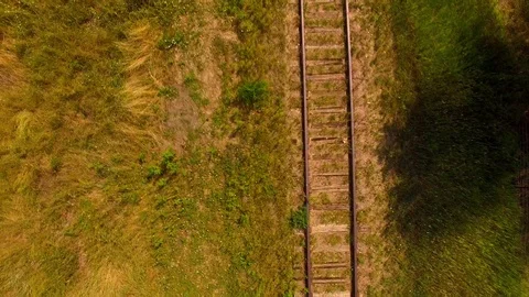 Low Flying Vertical Look Down at Tracks Color Corrected Stock Footage 98958898
