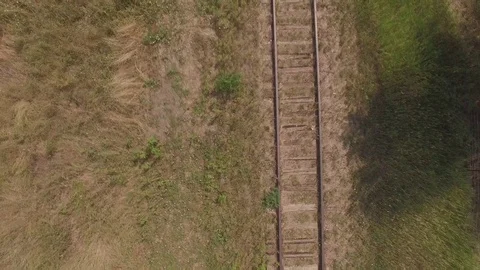 Low Flying Vertical Look Down at Tracks Stock Footage 98958899