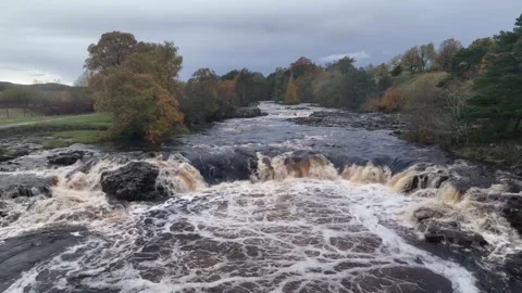 Low Force waterfall Teesdale, Durham, England, autumnal drone footage Stock Footage 264092912