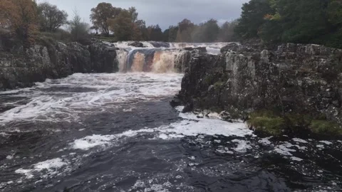 Low Force waterfall Teesdale, Durham, England, autumnal drone footage Stock-Footage 264092978