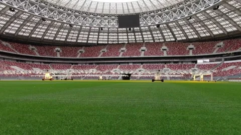 Low forward drone flight across stadium field Video stock 322933529