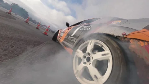 Low FPV Drift Chase on Asphalt Gymkhana Track, Milovice Stock Footage 324923197