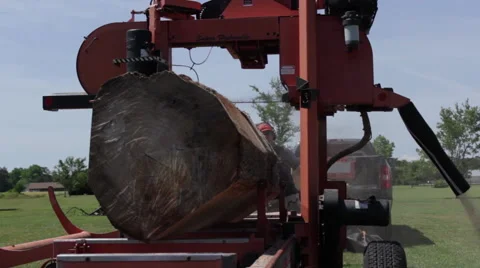 Low front angle CU of portable sawmill Stock Footage 40472148