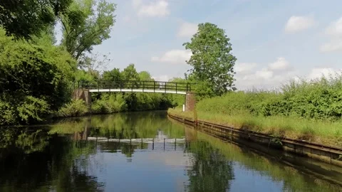 Low gliding shot along the Grand Union Canal in the West Midlands 動画素材 131658366
