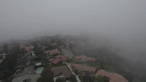 Low hanging mist over suburb 4k Stock Footage 155994783