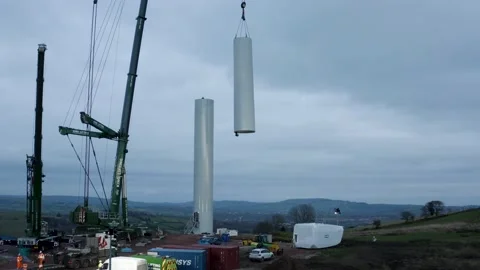 Low &amp; High angle of a wind turbine construction, 4K Stock Footage 179330187