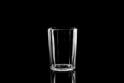 Low-key Studio Shot of a White silhouette of a faceted glass light glasses is 스톡 사진