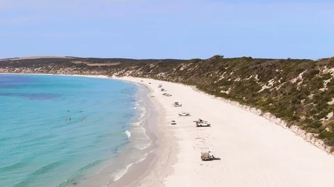 Low level aerial approach shot of Emu bay beach. Kangaroo Island. Video stock 104588231