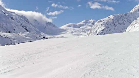 Low level aerial over glacier snow field in 4k Stock Footage 155420179
