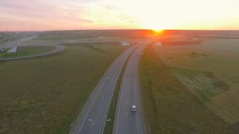 Low-level aerial perspective of highway intersection Stock Footage 77490316