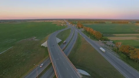 Low-level aerial perspective of highway intersection Stock Footage 77490387