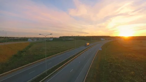 Low-level aerial perspective of highway intersection Stock Footage 77490795