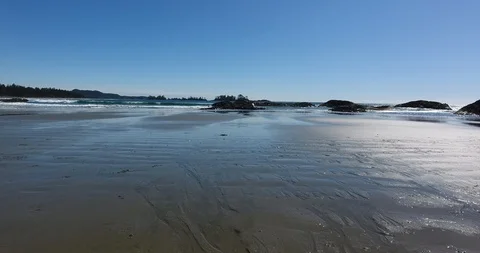 Low-level Aerial Push Shot of beach going out over water (1 of 2) Stock Footage 106849246
