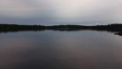 Low Level Drone Flight Over Calm Water at Dusk, Silver Lake, Ontario, Canada Stock Footage 342163543