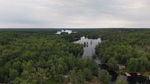 Low Level Drone Flight Over Calm Water at Dusk, Silver Lake, Ontario, Canada Stock Footage 342163756
