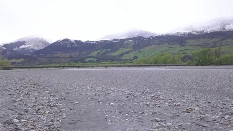 Low Level Drone Tracking Across Rees River Bridge Near Glenorchy, New Zealand 動画素材 248439684