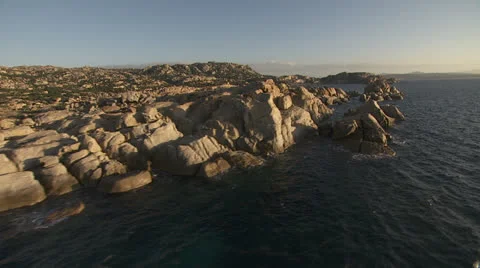 Low level flight along the coast 2, mediterranean sea, Sardinia / Italy Stock Footage 22936096