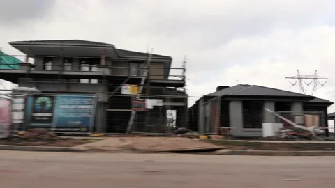 Low Level Flight Along Row of New House Construction Sites Aerial 4K Video stock 139125297