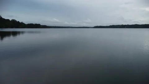 Low level flight over lake Видео 239938878