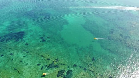 Low Level Flight Over Sea Surface, Aerial View, Golden Reflections On Stock Footage 225853743