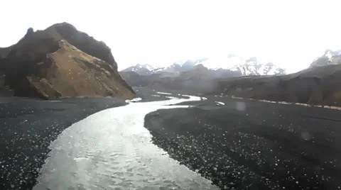 Low level flying through valley Stock Footage 35124643