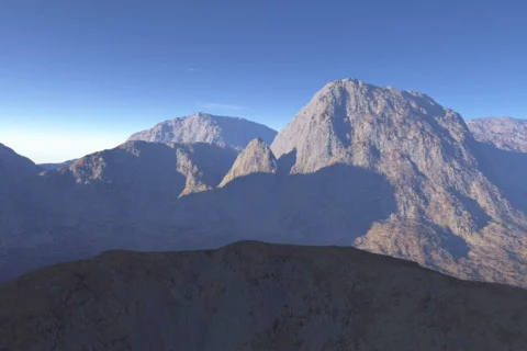 Low Level Mountain Fly By Stock Footage 65125