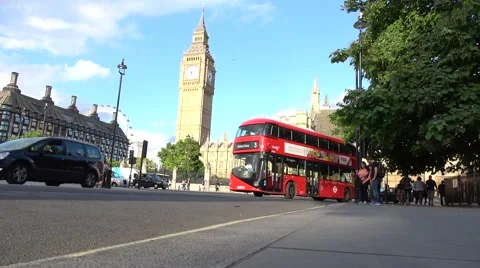 Low level red london buses and taxis in Parliament Square Stock Footage 65715864